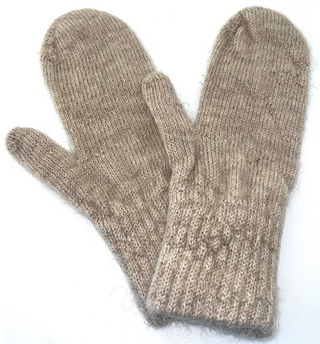 A pair of natural beige colored knit mohair mittens, displayed against a plain white background.