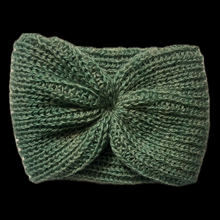 A dark green knitted headband with a large twisted bow in the center, shown against a solid black background.